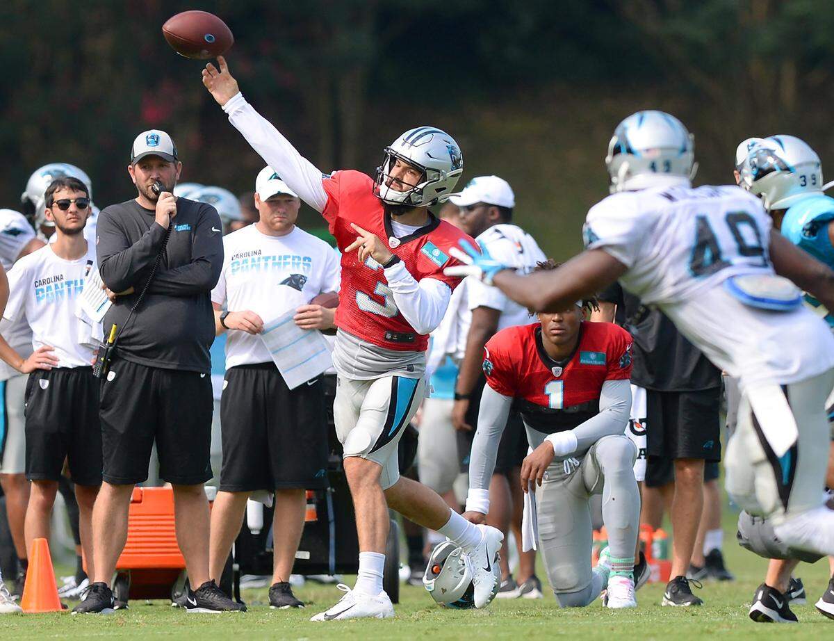 Carolina Panthers quarterback Will Grier passes to a receiver during training camp 2019 at Wofford College in Spartanburg, SC.
