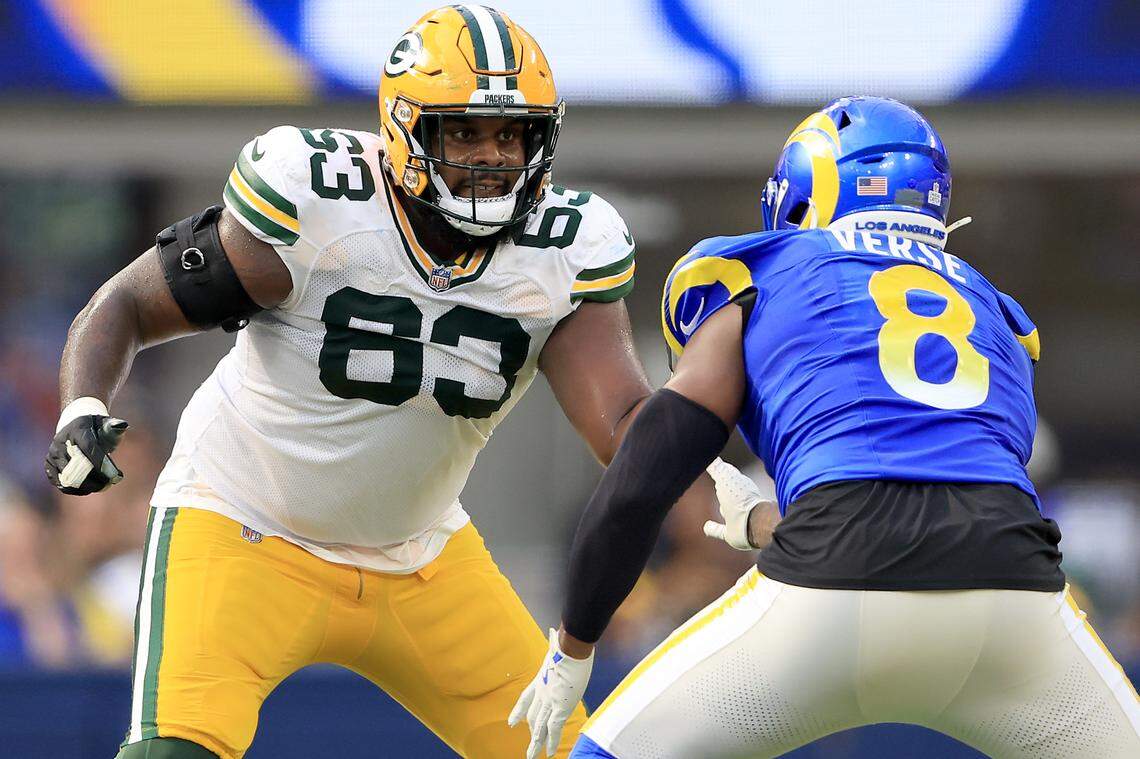 Rasheed Walker, then with the Green Bay Packers, blocks Jared Verse of the Los Angeles Rams during a 2024 game. 