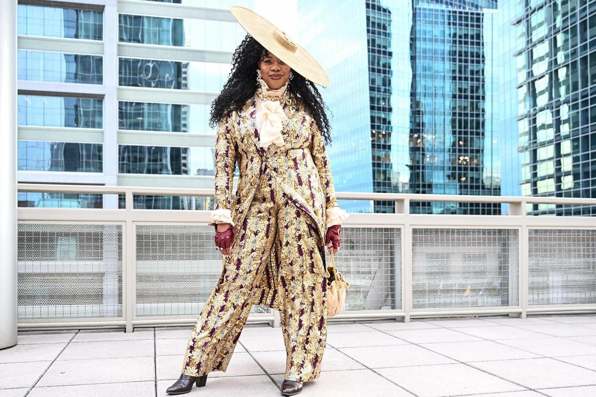 Event curator and Charlotte resident, Perrine “Professor P” DeShields poses for a photo during “Superfine at the Gantt: Exploring Black Dandyism” at The Harvey B. Gantt Center, Friday, May 2, 2025, in Charlotte, N.C.
