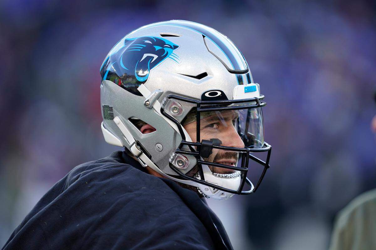 Carolina Panthers quarterback Baker Mayfield (6) watches the scoreboard in the second half of an NFL football game against the Baltimore Ravens Sunday, Nov. 20, 2022, in Baltimore. (AP Photo/Patrick Semansky)
