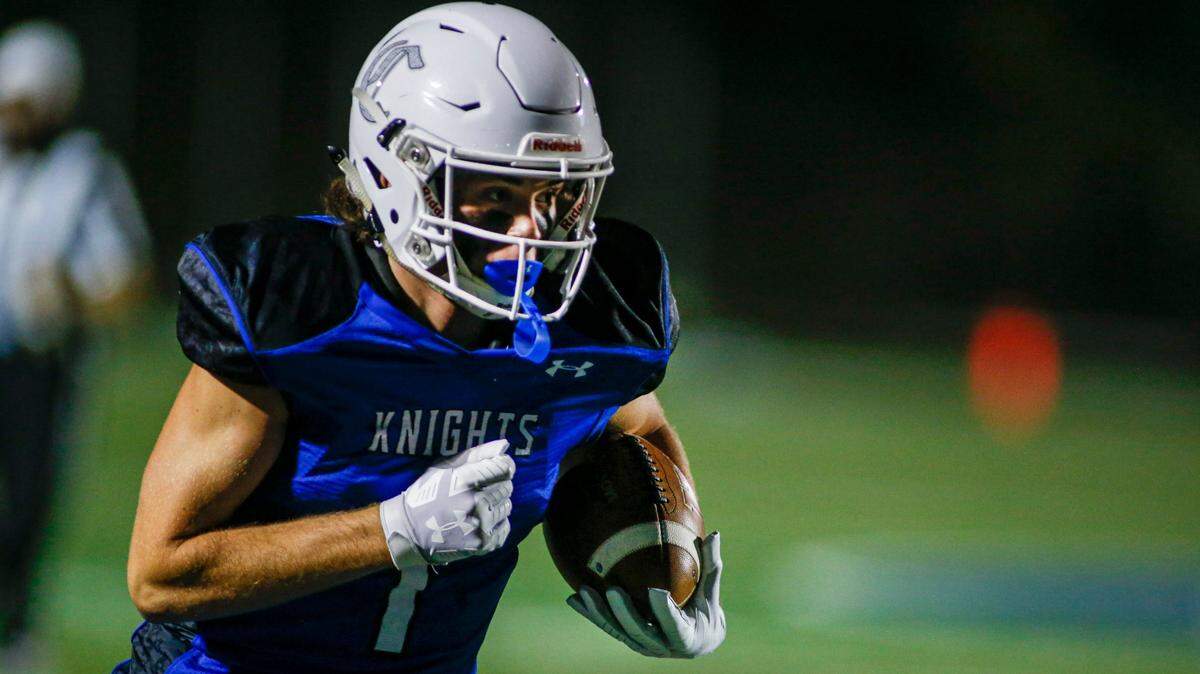 Charlotte Christian’s Cade Nicholson carries the football against Providence Day in the first half of a high school football game in Charlotte, N.C., Friday, Oct. 16, 2020. (Nell Redmond photo)