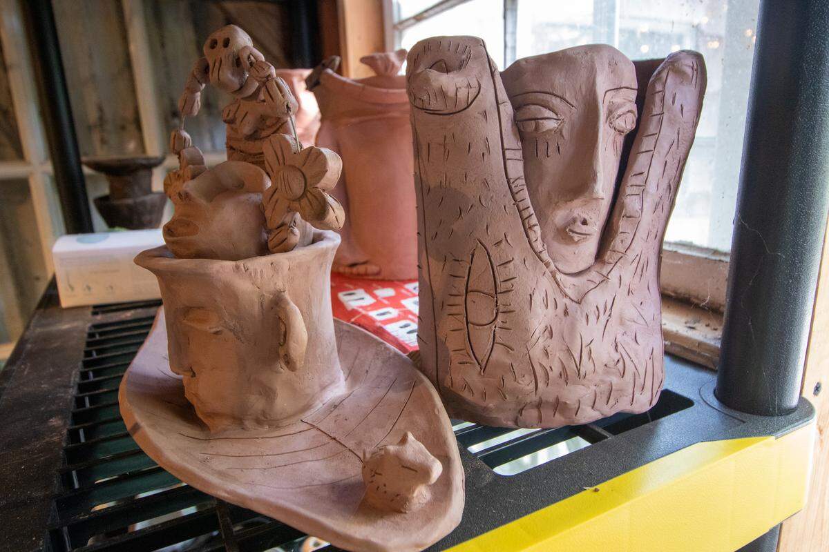 This is some of Nico Amortegui’s ceramic work. During a visit to Mexico in June, sponsored by the Arts & Science Council, Amortegui made pottery with five families. Inspired by what he learned, he built a kiln near his studio.