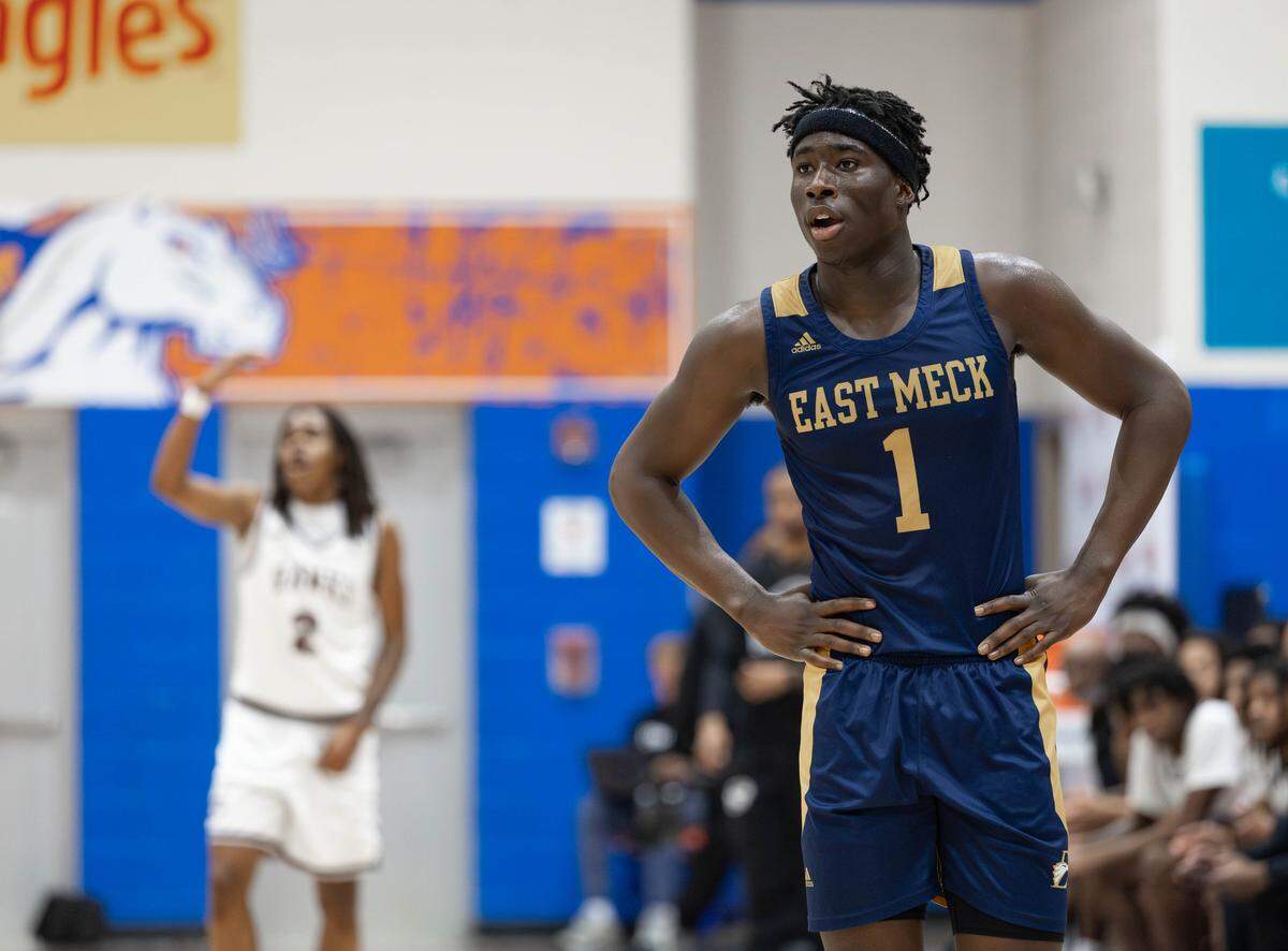 East Meck’s Nixon Wright looks on as his team looks to inbound the ball at the Mike Gminski Classic at Marvin Ridge High School on Dec. 27, 2025.