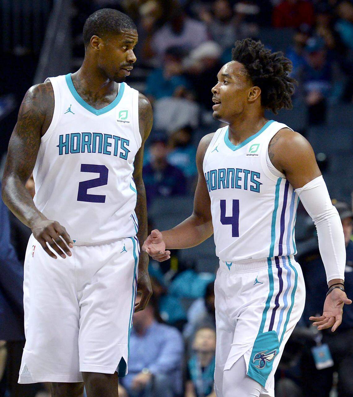 Barring any trades, forward Marvin Williams, left, and guard Devonte Graham should be back with the Charlotte Hornets next season.