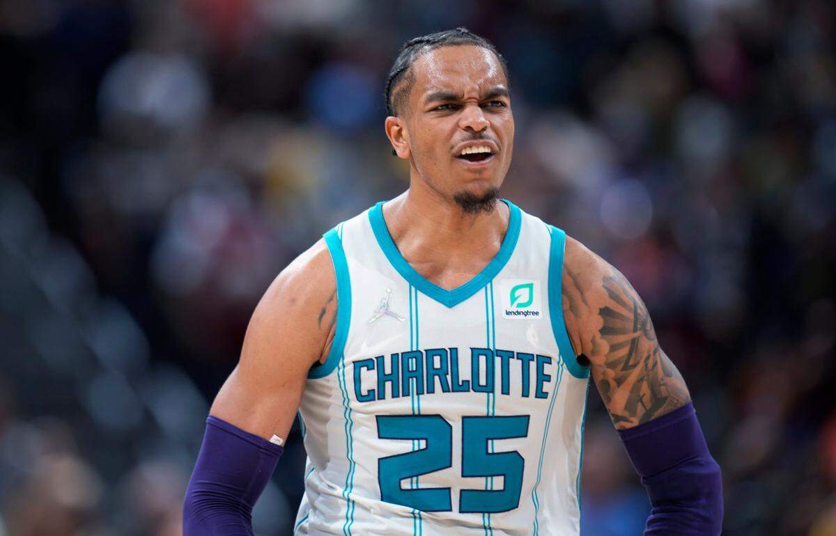 Charlotte Hornets forward P.J. Washington reacts after hitting a 3-point basket in the closing minutes of the team’s NBA basketball game against the Denver Nuggets on Thursday, Dec. 23, 2021, in Denver. The Hornets won 115-107. (AP Photo/David Zalubowski)