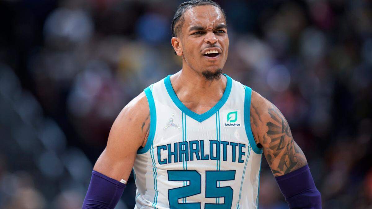 Charlotte Hornets forward P.J. Washington reacts after hitting a 3-point basket in the closing minutes of the team’s NBA basketball game against the Denver Nuggets on Thursday, Dec. 23, 2021, in Denver. The Hornets won 115-107. (AP Photo/David Zalubowski)