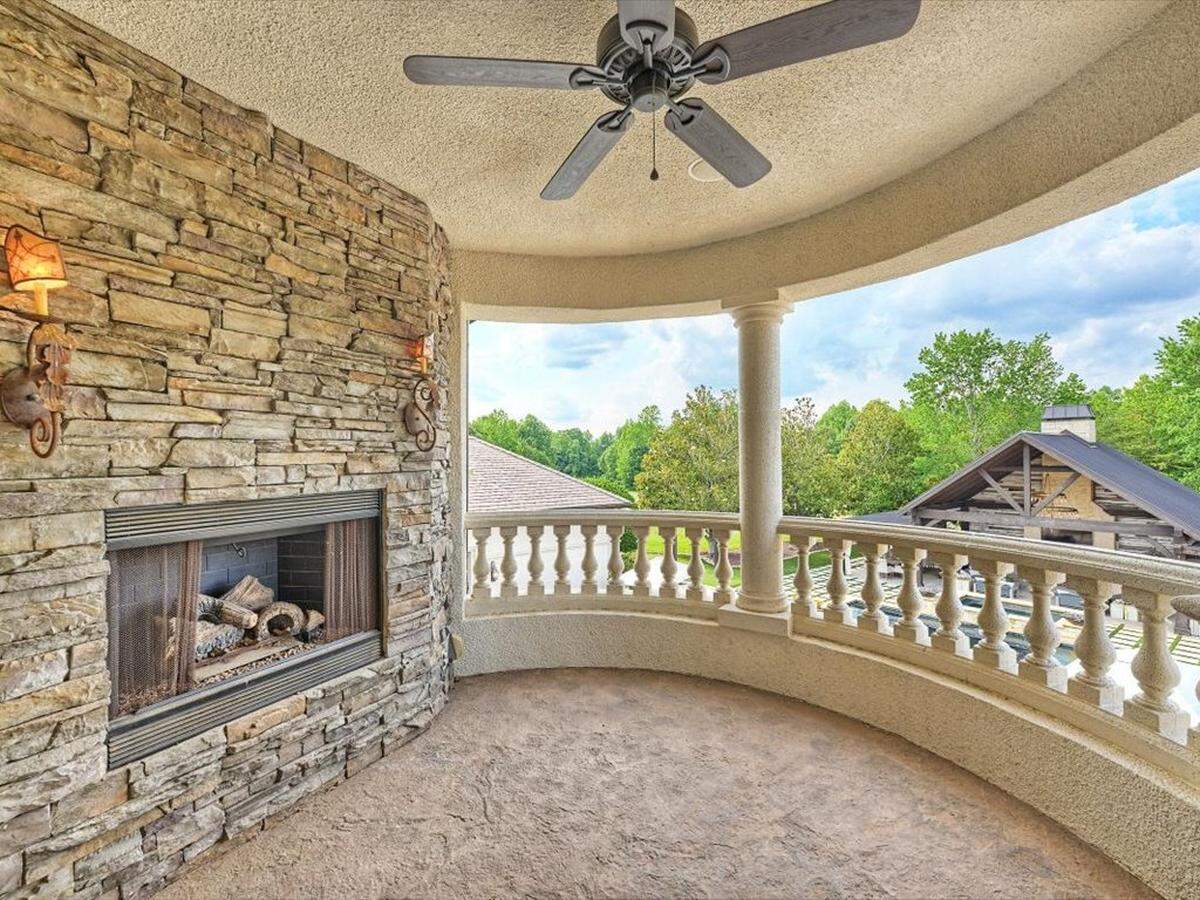 Shown is the exterior upper-level terrace of the 9,986-square-foot mansion at 355 Pelham Lane in Rowan County near Mooresville.