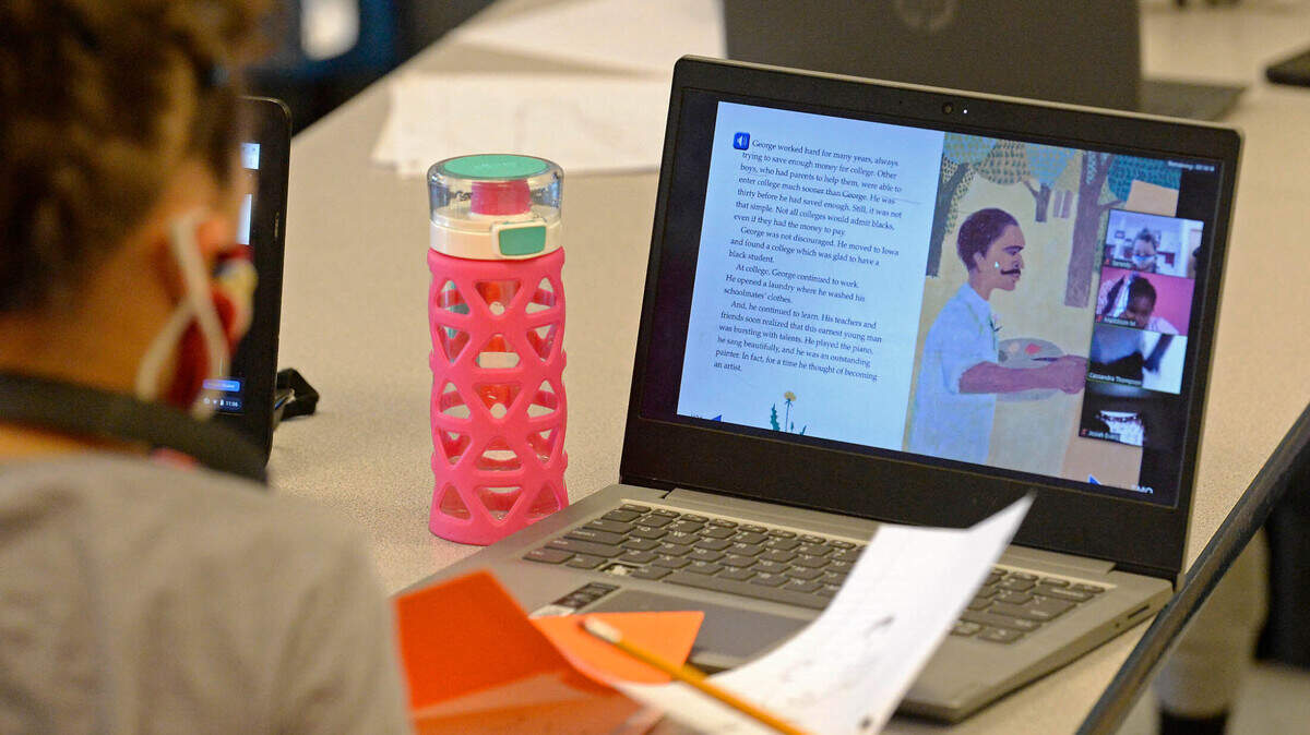 A students works on their lessons during a session of the YMCA of Greater CharlotteÕs School Days+ remote learning program at the Stratford Richardson YMCA on Wednesday, February 3, 2021. Families from all different schools enroll their kids in the program, which is offered at multiple YMCA locations. The Y provides a safe and supportive space for students to do their individual remote learning.