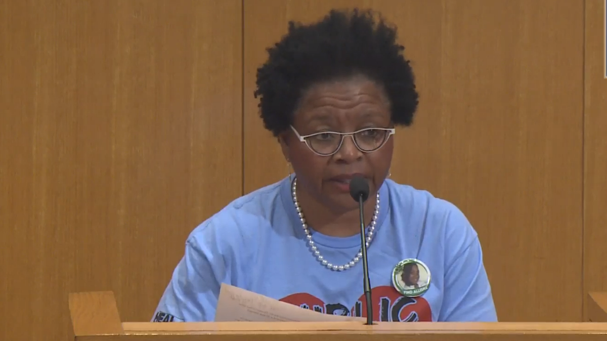 Janice Robinson, of Mecklenburg County’s Public School Strong, speaks during a public hearing at a CMS board meeting on Aug. 22, 2023.