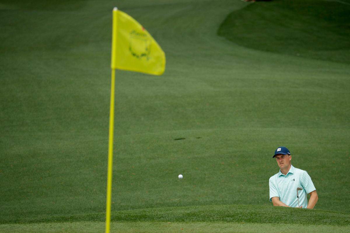 Jordan Spieth hits out of the bunker on the second hole during a practice round for the Masters golf tournament Tuesday, April 9, 2019, in Augusta, Ga. (AP Photo/Charlie Riedel)