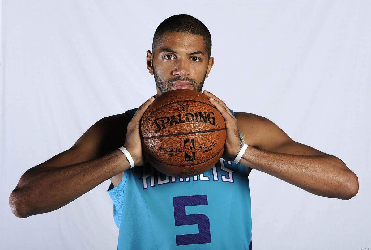 Nicolas Batum poses for a portrait during Charlotte Hornets media day at Spectrum Center on Sept. 25, 2017.