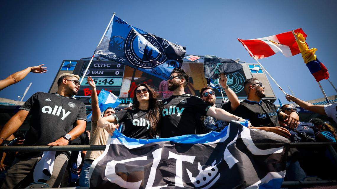 Charlotte FC fans cheer in the stands during warms up before a game between the Charlotte FC and the Vancouver Whitecaps at Bank of America Stadium in Charlotte, N.C., Sunday, May 22, 2022.
