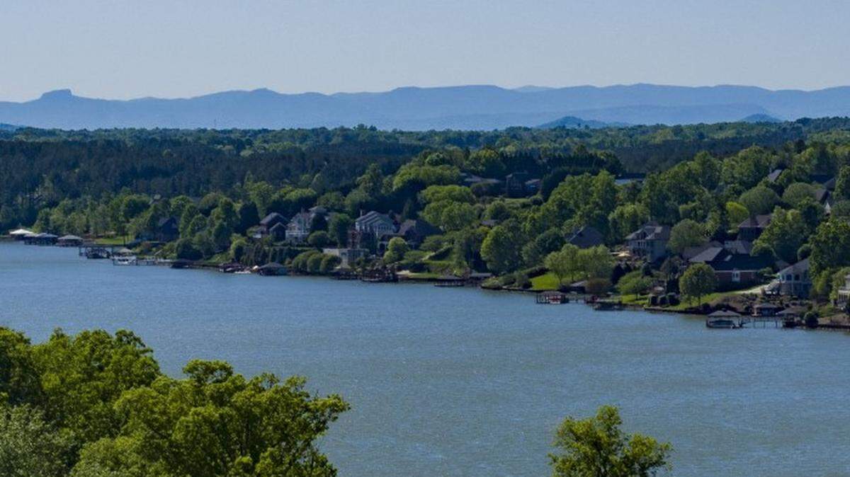 A boater who jumped into this North Carolina lake during a police pursuit was sentenced to 17 1/2 years in prison Tuesday, Feb. 11, 2025, on drug and gun charges, federal prosecutors said.