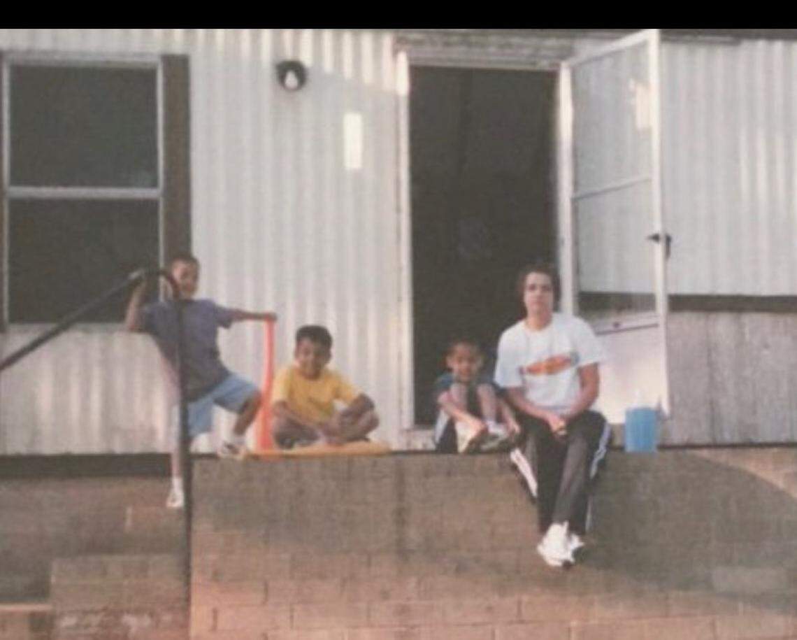 Jenny Bennett (right) worked as many as three jobs at a time to support her three sons in Davie County. Twins Cody and Caleb now play for the Charlotte Hornets.