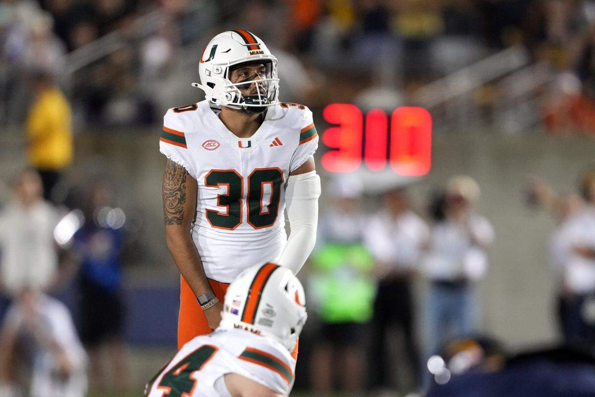 Oct 5, 2024; Berkeley, California, USA; Miami Hurricanes place kicker Andres Borregales (30) prepares to kick a field goal against the California Golden Bears during the second quarter at California Memorial Stadium. Mandatory Credit: Darren Yamashita-Imagn Images