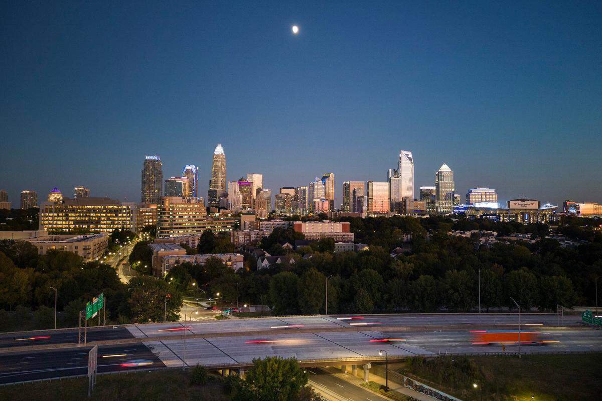 Motorists travel along Interstate 77 near uptown. The city’s skyline has changed dramatically in the past several decades but one question has remained: Is Charlotte a “world-class” city or can it become one?
