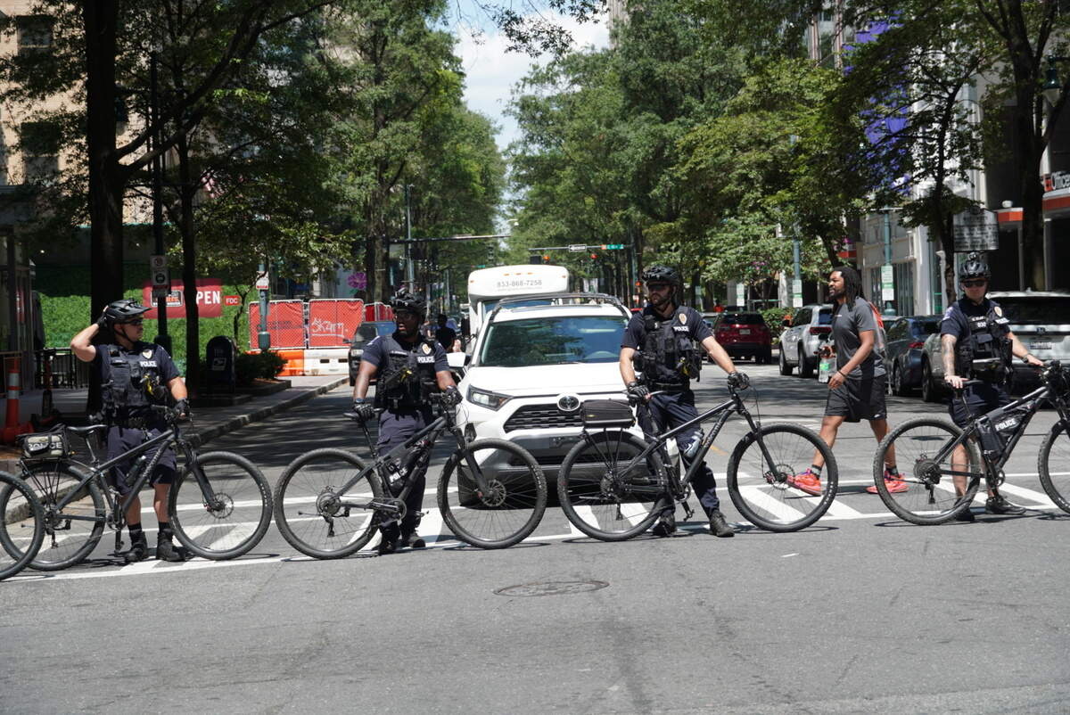 CMPD’s Bike Patrol escorting protesters through the street of uptown Charlotte.
