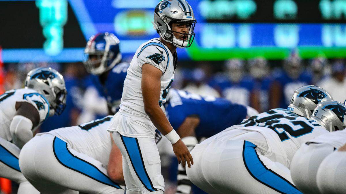 Carolina Panthers quarterback Bryce Young (9) takes a snap against the New York Giants during the first quarter at MetLife Stadium.