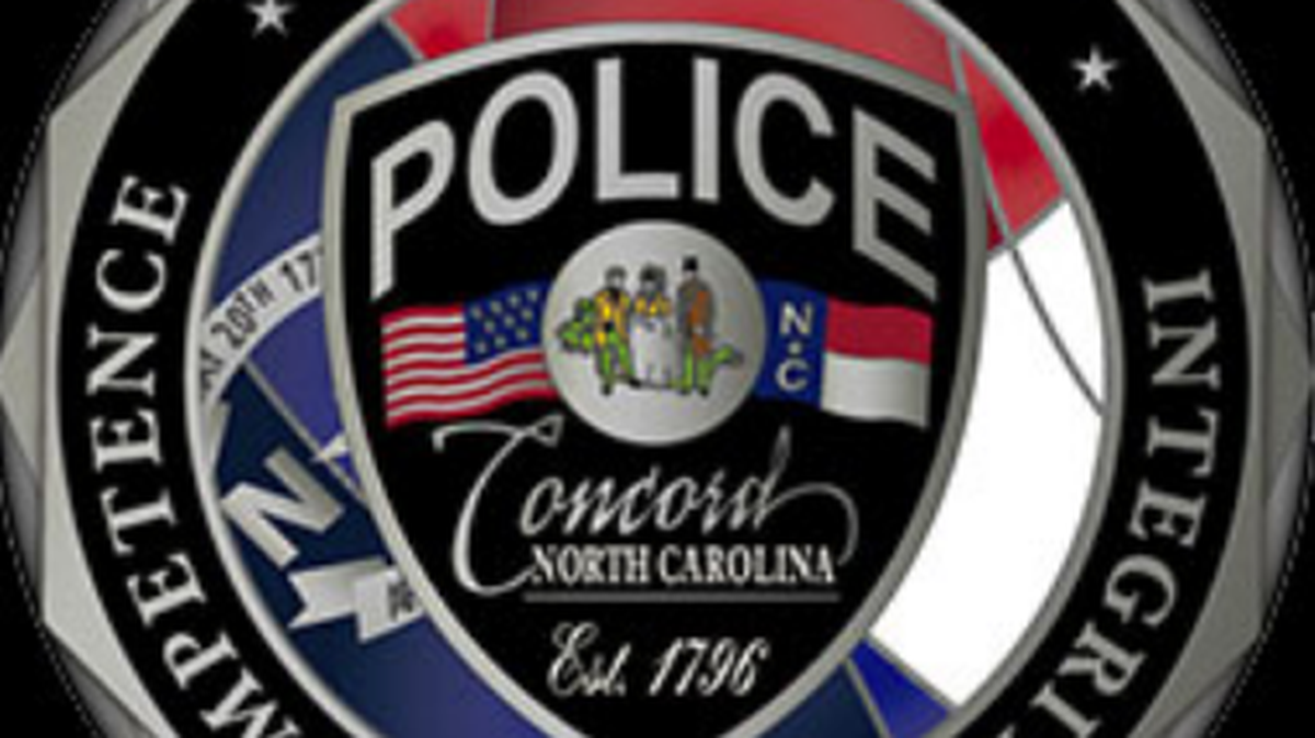 A suspect attempting to steal a car at a local dealership was shot and killed early Sunday by a Concord police officer after the two were involved in a physical confrontation, police said.