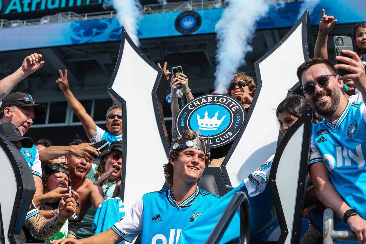Charlotte FC midfielder Ben Bender mingles with fans as he is crowned “Man of the Match” after his team’s 2-0 win over the New York Red Bulls at Bank of America Stadium on Saturday in Charlotte. Bender scored the game’s first goal.