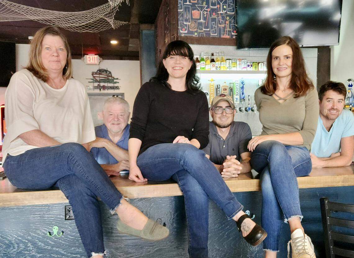 The Hideaway LKN co-owners are Debbie and John Huffman, Tina and Jay Kleinschmidt, and Laura and Ryan Messenger.