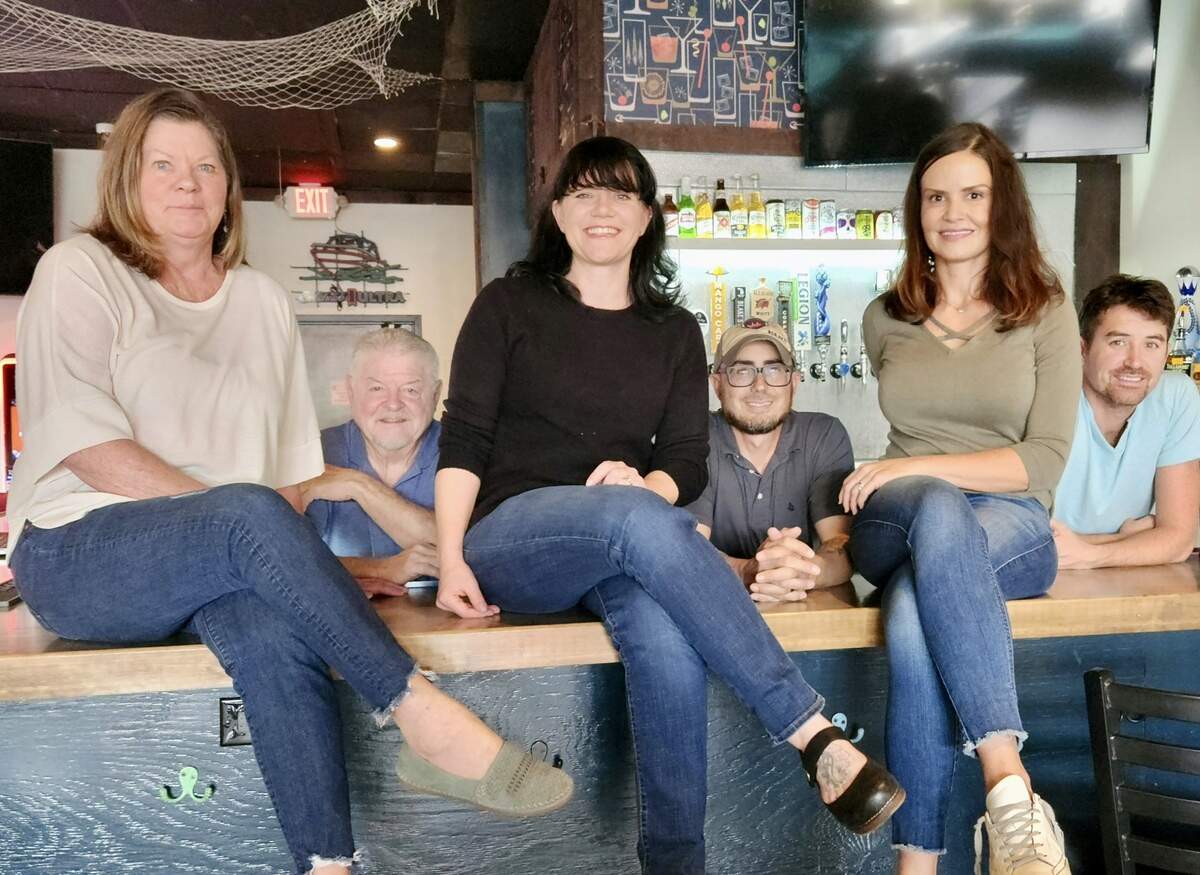The Hideaway LKN co-owners are Debbie and John Huffman, Tina and Jay Kleinschmidt, and Laura and Ryan Messenger.