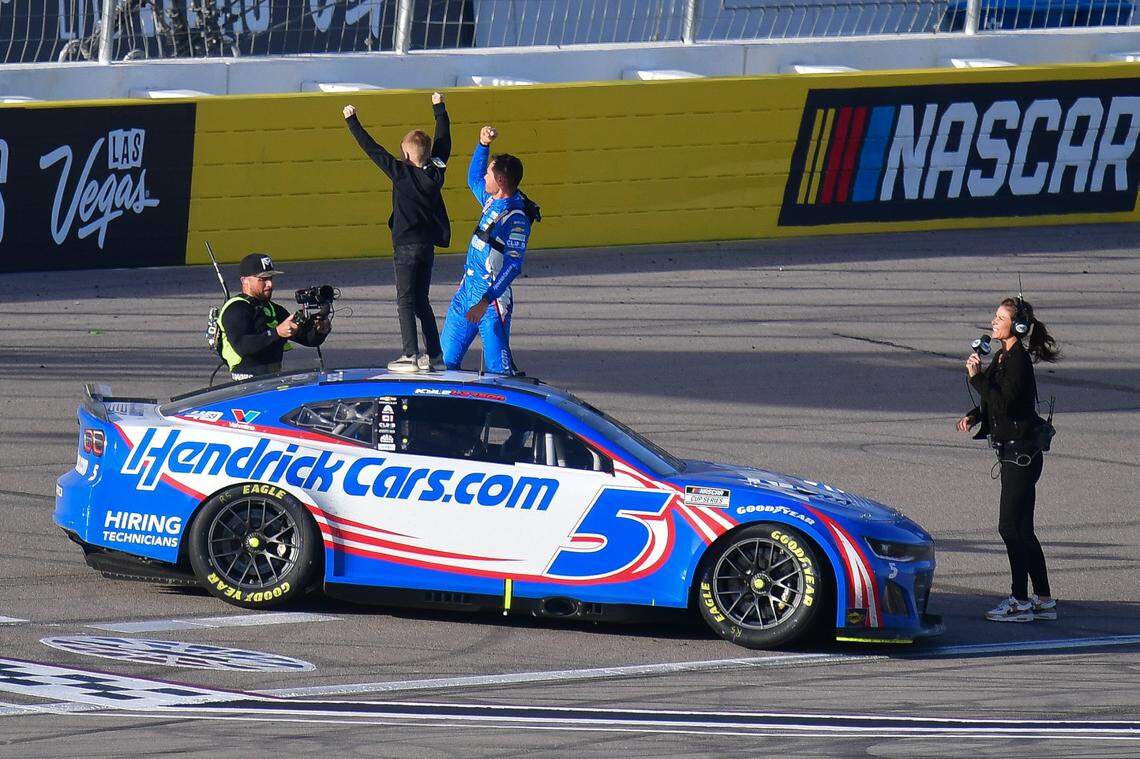Kyle Larson and his 9-year-old son, Owen, celebrate Larson’s victory in the Pennzoil 400 at Las Vegas Motor Speedway.