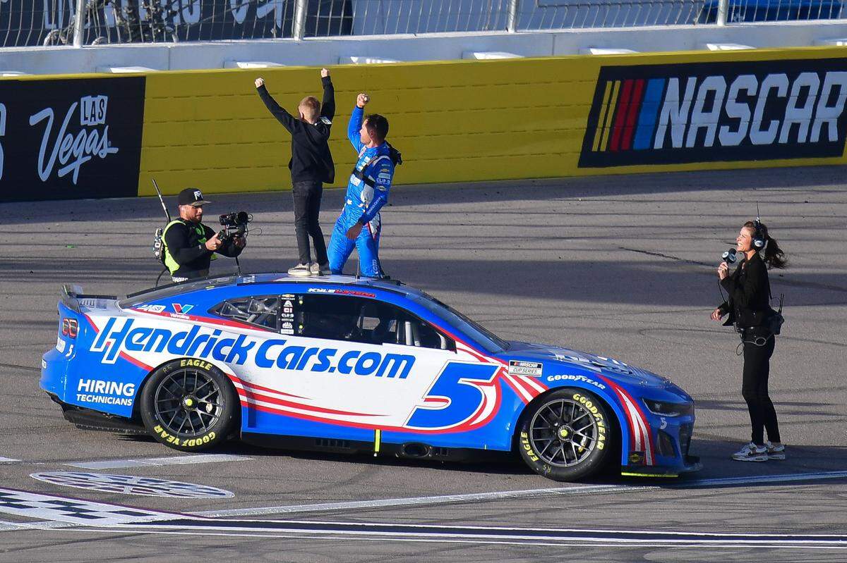 Kyle Larson and his 9-year-old son, Owen, celebrate Larson’s victory in the Pennzoil 400 at Las Vegas Motor Speedway.
