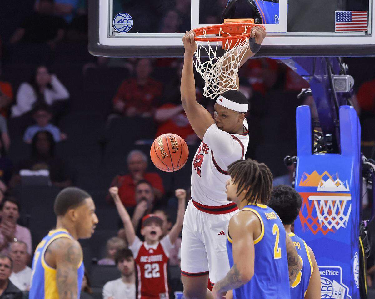N.C. State's Ven-Allen Lubin slams in two during the first half of the Wolfpack’s second-round ACC Tournament game against Pitt on Wednesday, March 11, 2026, at the Spectrum Center in Charlotte, N.C. 