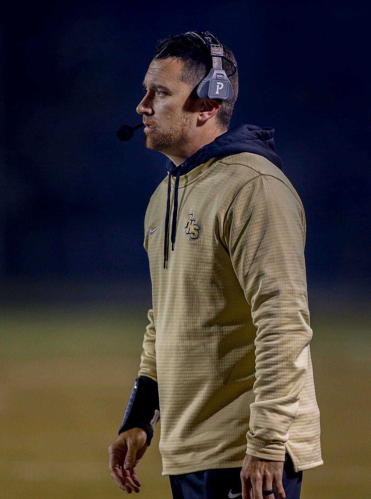 Providence coach Brad Bowles watches his team play West Mecklenburg in the first quarter Friday. Providence won its fifth straight game.