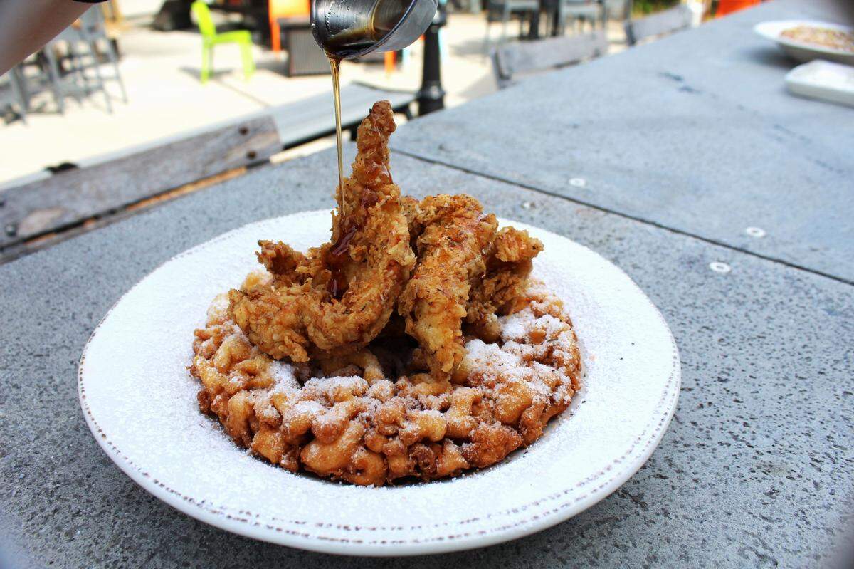 State of Confusion’s Fried Chicken Funnel Cake breakfast.