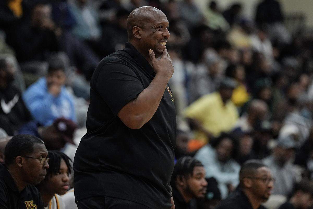 West Charlotte head coach Jacoby Davis looks on during the second half of a boys varsity basketball game against Oak Hill Academy, Friday, Dec. 19, 2025, in Charlotte, N.C.