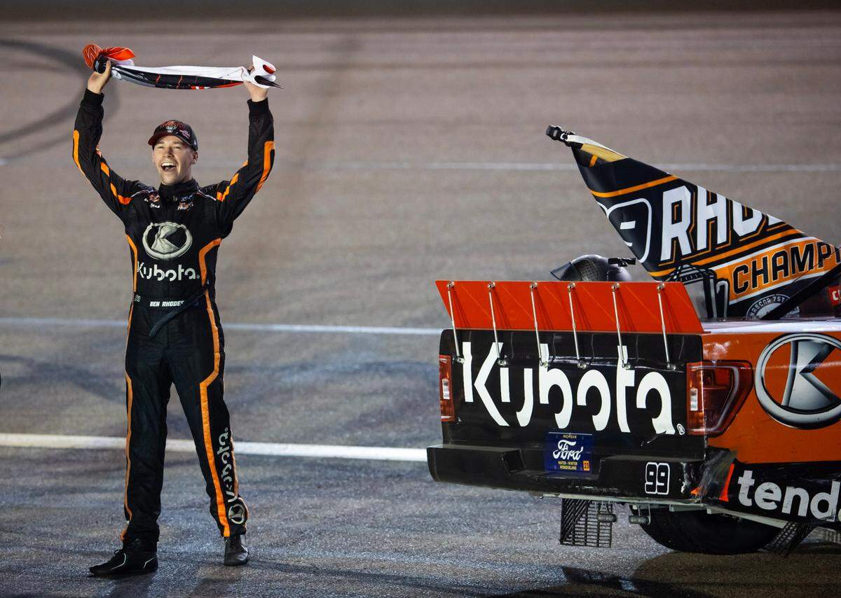 Nov 3, 2023; Avondale, Arizona, USA; NASCAR Truck Series driver Ben Rhodes celebrates after winning the Truck Series Championship during the Championship Race at Phoenix Raceway.