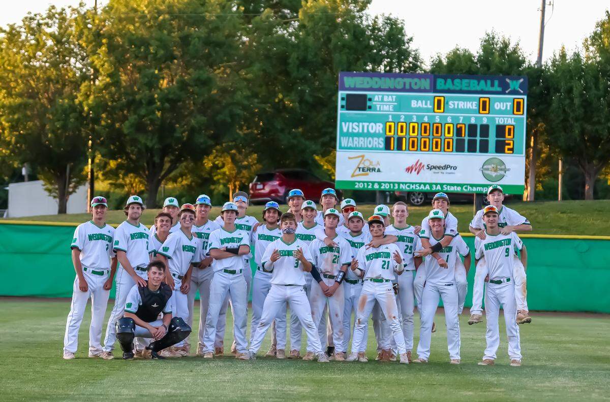 Weddington players take a celebration photo after defeating South Mecklenburg in the first round of NCHSAA 4A baseball playoffs on May 6th, 2025 at Weddington high school