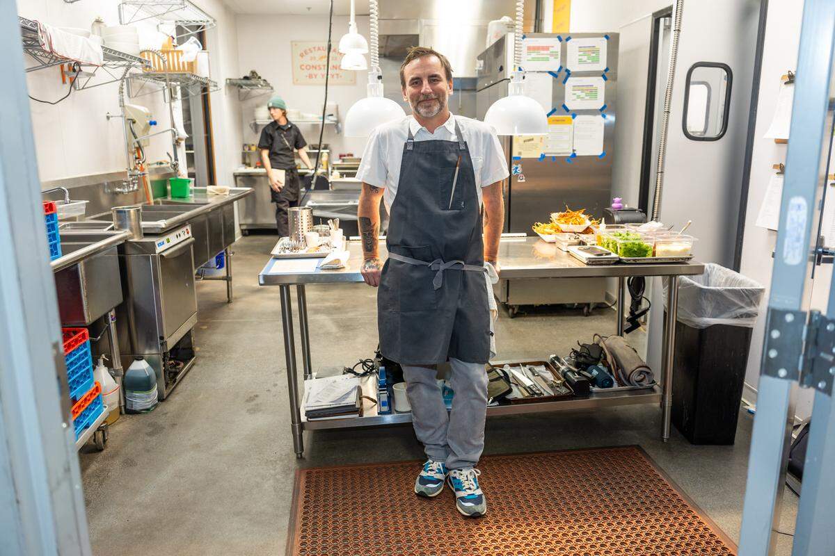 Chef Sam Diminch, shown here at Restaurant Constance, gives back to the community in big ways, including fundraising for NardMoor in his hometown of Myrtle Beach, feeding Hurricane Helene victims in Western North Carolina and managing the kitchen at HopeWay in Charlotte.