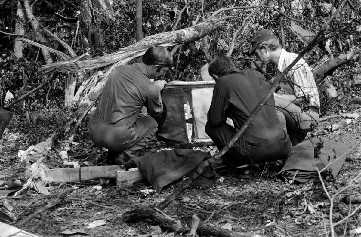 First responders on the scene of the crash of Eastern Flight 212 in Charlotte on Sept. 11, 1974.
