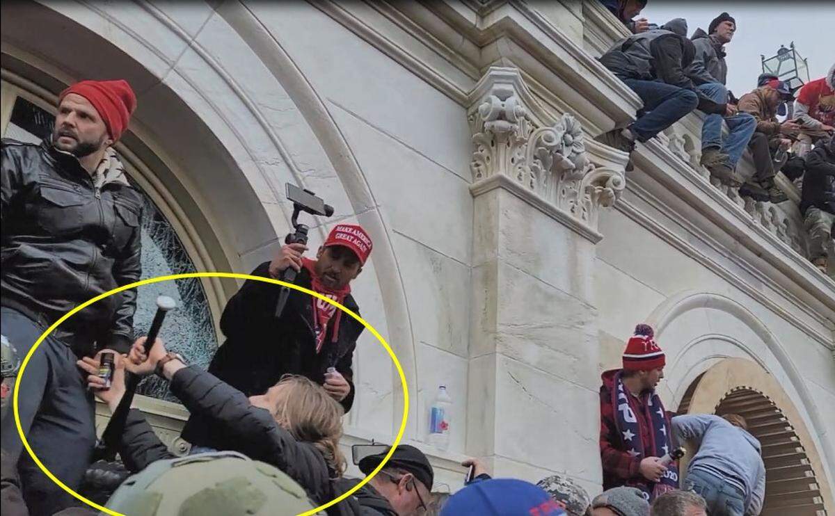 Aiden Bilyard of Cary holds a baseball bat, which the FBI says he later used to break out a window in the U.S. Capitol during the riot by Donald Trump supporters on Jan. 6, 2021.