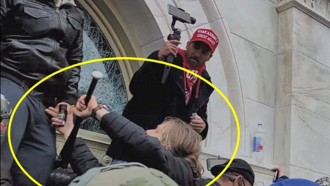Aiden Bilyard, 20, of Cary holds a baseball bat, which the FBI says he later used to break out a window in the U.S. Capitol during the riot by Donald Trump supporters on Jan. 6, 2021. He will be sentenced Feb. 2, 2023 by a federal judge in Washington, D.C.