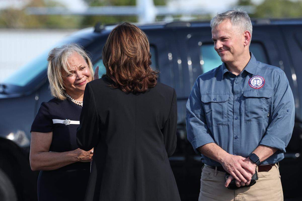 Vice President Kamala Harris is greeted by Mayor Vi Lyles, left, upon landing in North Carolina to receive on-the-ground briefing about the continued recovery efforts that are occurring in communities across the state after Hurricane Helene in Charlotte, NC on Saturday, Oct. 5, 2024.