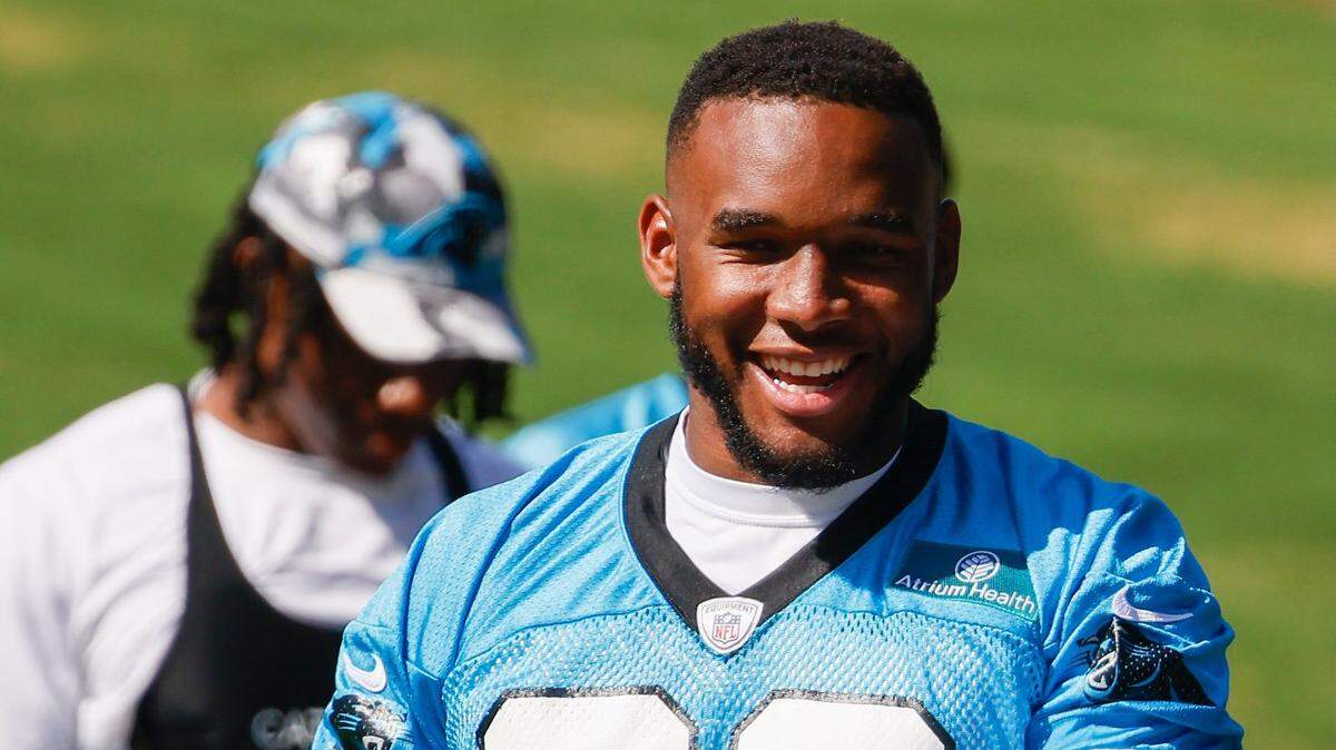 Former Carolina Panthers linebacker Amaré Barno was charged with domestic assault and assault on a female and allegedly caught on camera shoving his ex-girlfriend, according to court documents.  