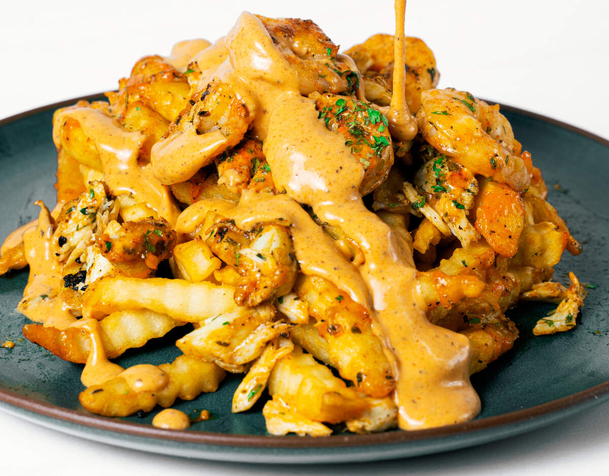 Lulu’s crab fries, topped with shrimp.