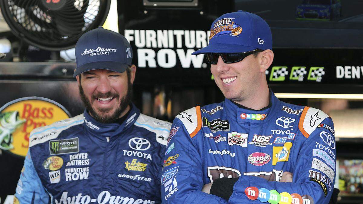 Martin Truex Jr. (left) joins Kyle Busch at Joe Gibbs Racing this season.