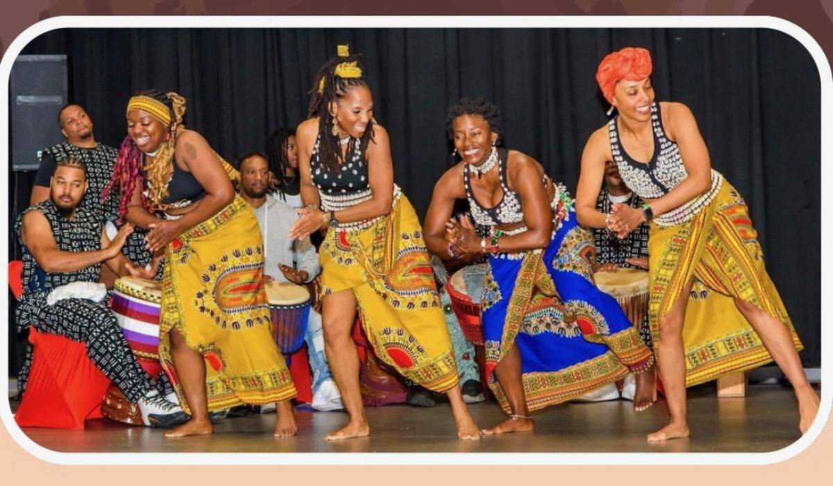 Company members of the Charlotte African Drum and Dance Collective perform for Kwanzaa in 2025.