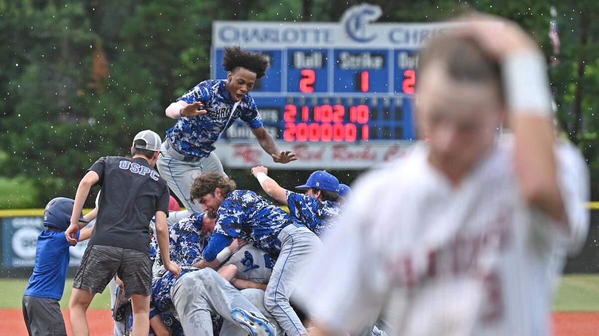 High school sports, with all their joyful and teachable moments, would never be possible without underappreciated high school coaches. In this photo, members of the Charlotte Christian baseball team celebrate an NCISAA state championship win in May.