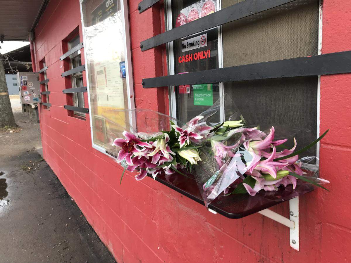 Visitors left flowers at the Brooks’ Sandwich House as it was closed on Monday.