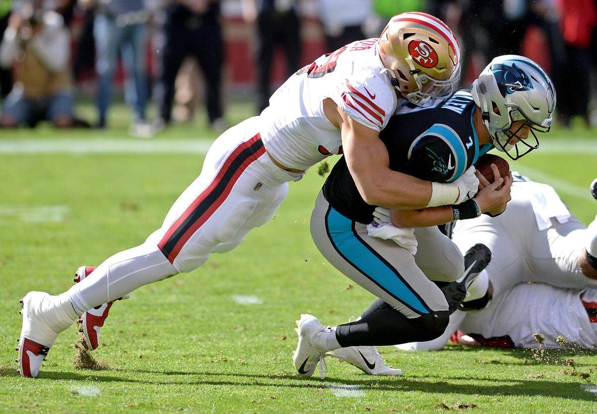 Carolina Panthers quarterback Kyle Allen, right, is sacked by San Francisco 49ers defensive lineman Nick Bosa during the Panthers’ 51-13 loss Sunday.