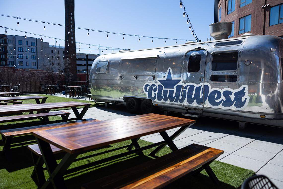Brad Bergman is buying the former Sycamore Brewing operation, which has been renamed as Club West. The rooftop area at Club West includes Sycamore’s former signature Airstream with the new business name.