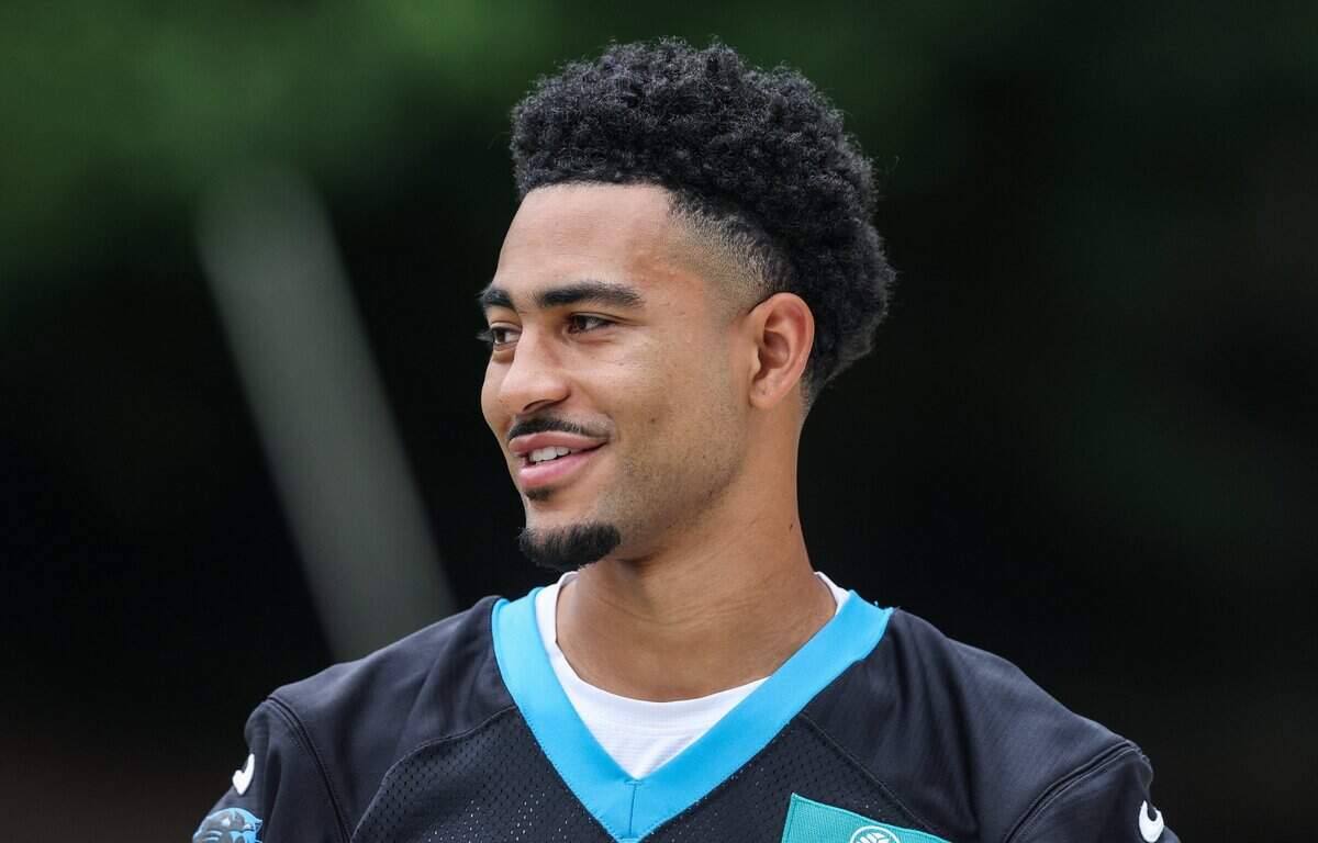 Panthers quarterback Bryce Young heads to the practice field for mandatory minicamp in Charlotte on Tuesday, June 9, 2026