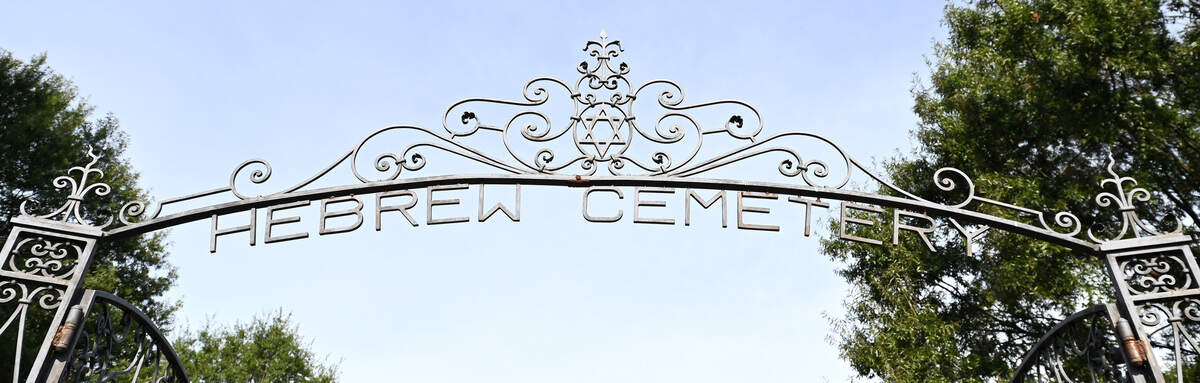 The entry gate to the Hebrew Cemetery of Greater Charlotte, NC on Friday, August 11, 2023. The cemetery has eyes on expanding and providing burial space for the next 150 years, but it’s worried about the potential sale of an adjacent school to the highest bidder for apartments or a mixed-use development. The cemetery is one of the more prominent Jewish cemeteries in North Carolina.