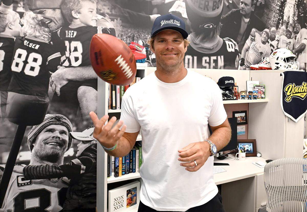 Former Carolina Panthers tight end Greg Olsen inside his office in May.